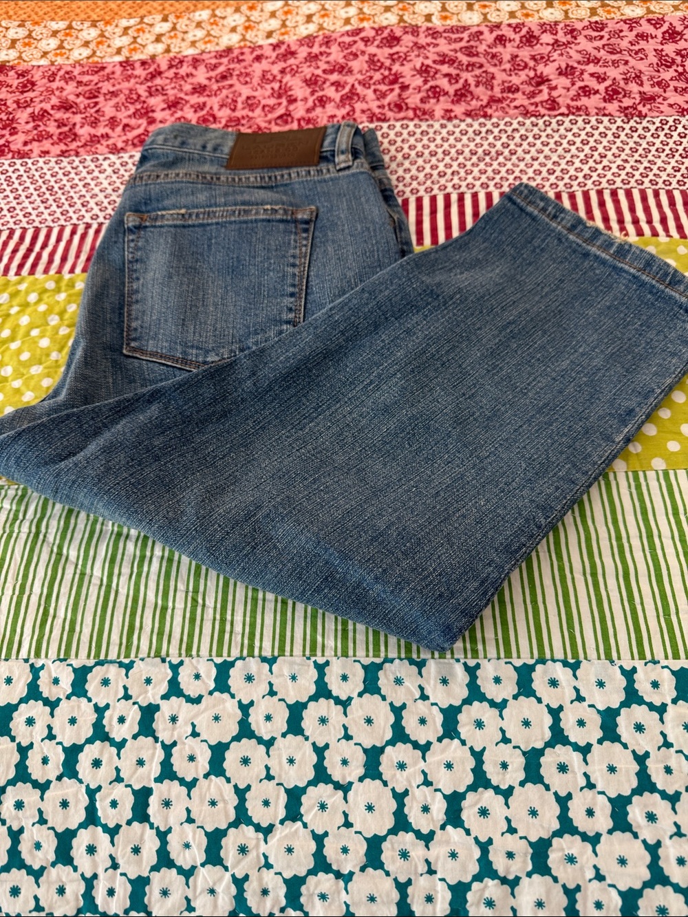 Lauren Ralph Lauren medium wash, low rise , mid calf jeans in a stretchy denim.